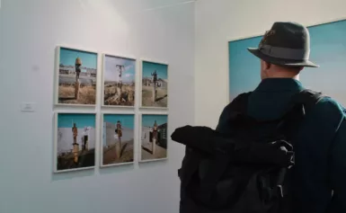 person wearing black fedora hat