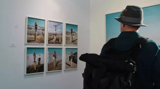 person wearing black fedora hat