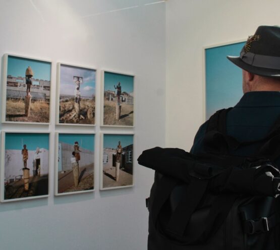 person wearing black fedora hat