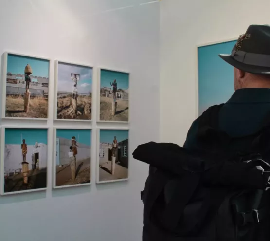 person wearing black fedora hat