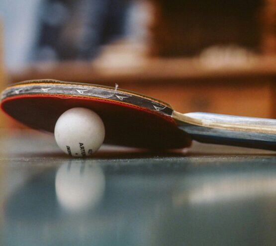 white golf ball on blue table